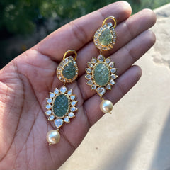 Carved green stone danglers