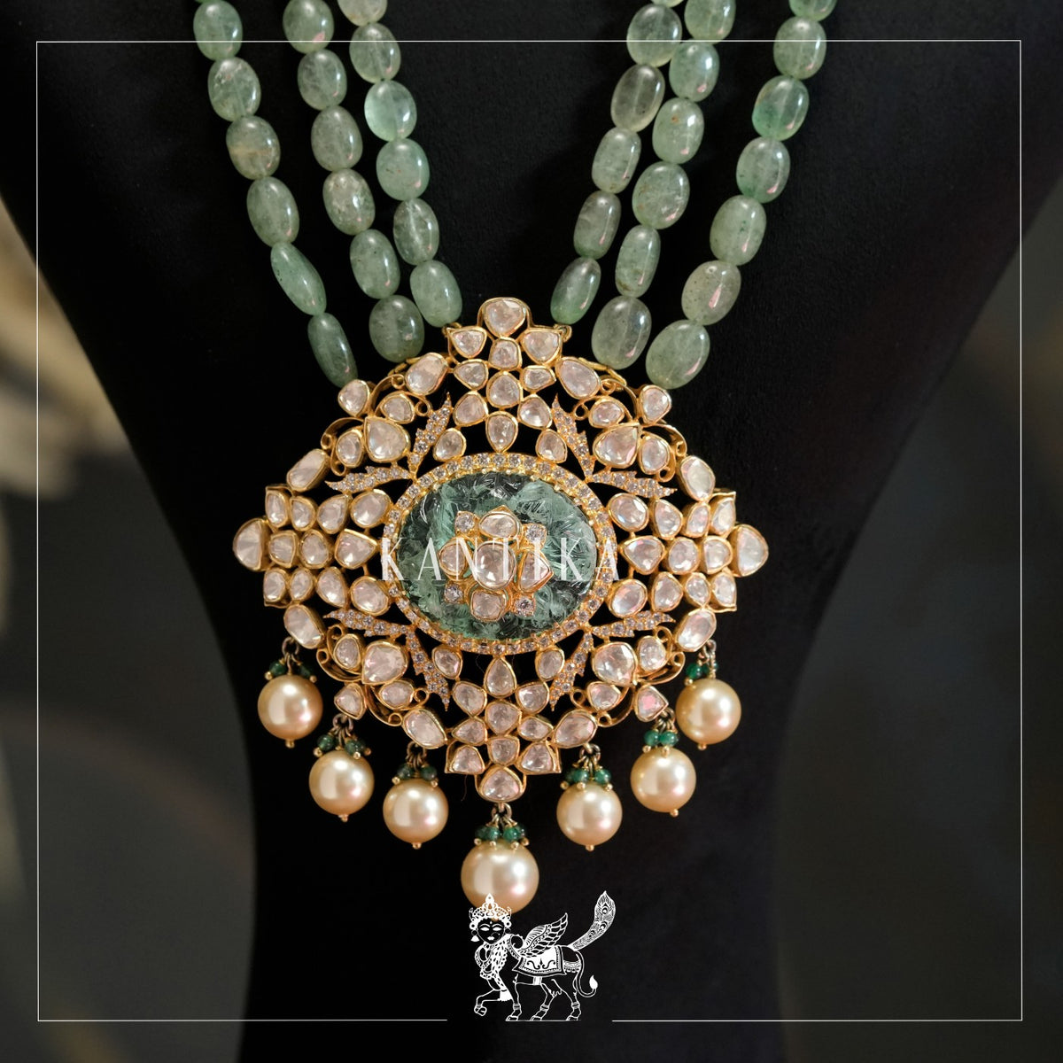 Elaborate Pendant with Emerald Stones